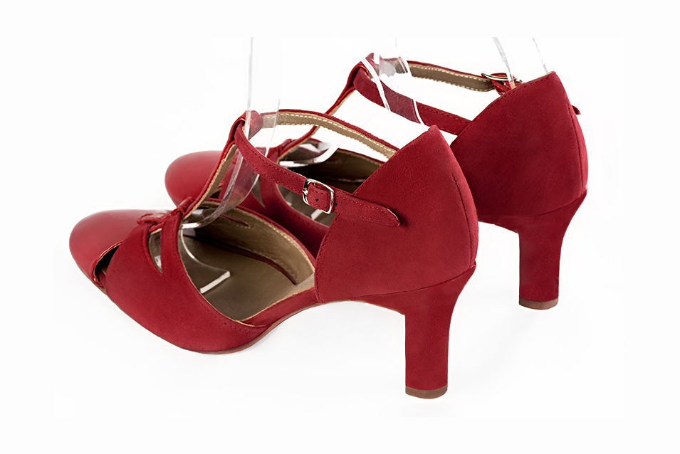 French elegance and refinement for these scarlet red dress T-strap open side shoes, 
                available in many subtle leather and colour combinations. A pretty model with a comfortable "Salomé" strap and good support.
Its charming spyglass cut-out gives you plenty of scope for personalisation.  
                Matching clutches for parties, ceremonies and weddings.   
                You can customize these shoes to perfectly match your tastes or needs, and have a unique model.  
                Choice of leathers, colours, knots and heels. 
                Wide range of materials and shades carefully chosen.  
                Rich collection of flat, low, mid and high heels.  
                Small and large shoe sizes - Florence KOOIJMAN